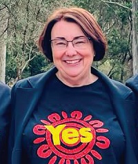 Mayor Lisa Lake wearing a t-shirt with the word yes on it
